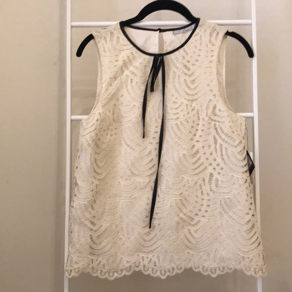 Cream lace sleeveless blouse